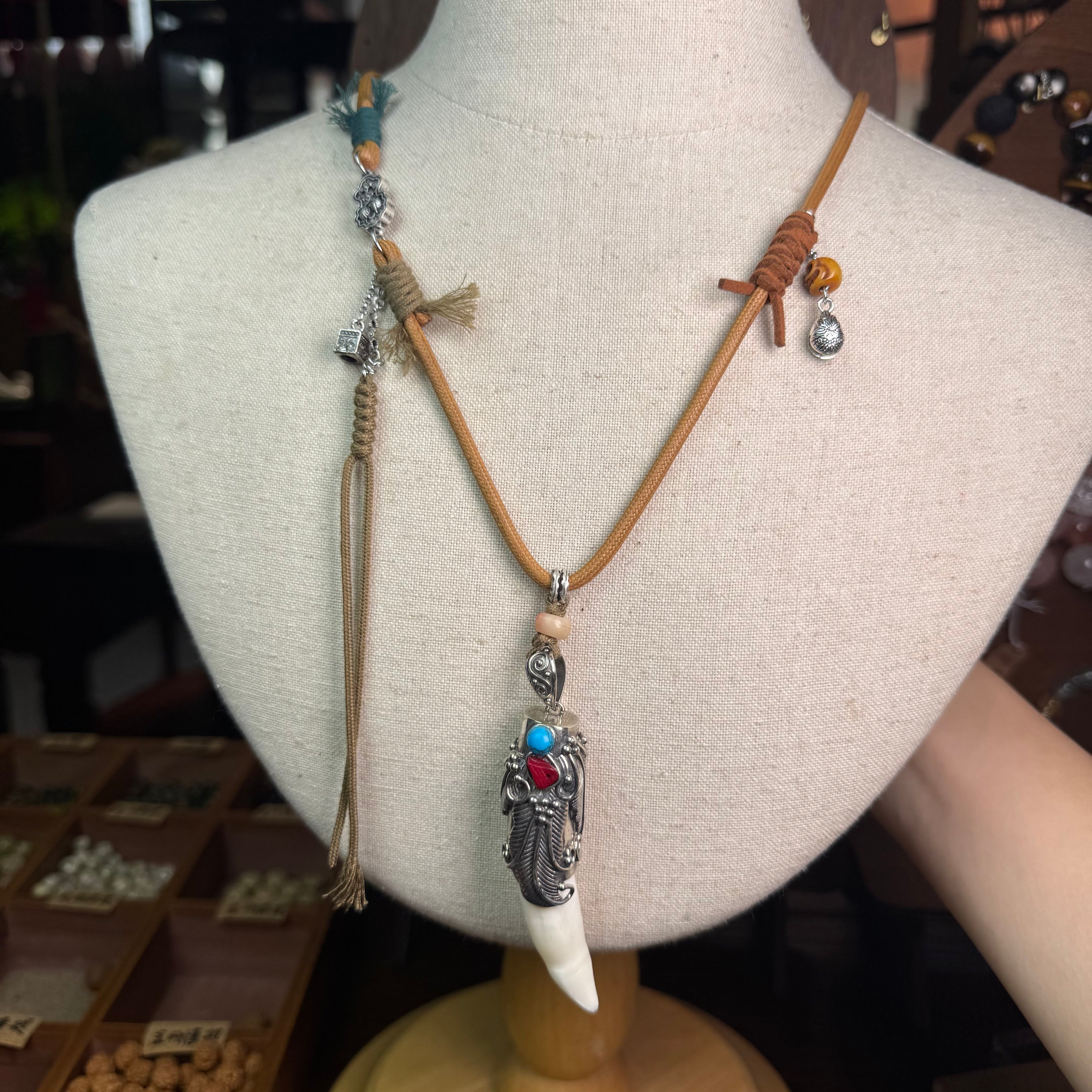 Silver Filigree Crocodile Tooth Necklace | Tan Leather Tassel Cord